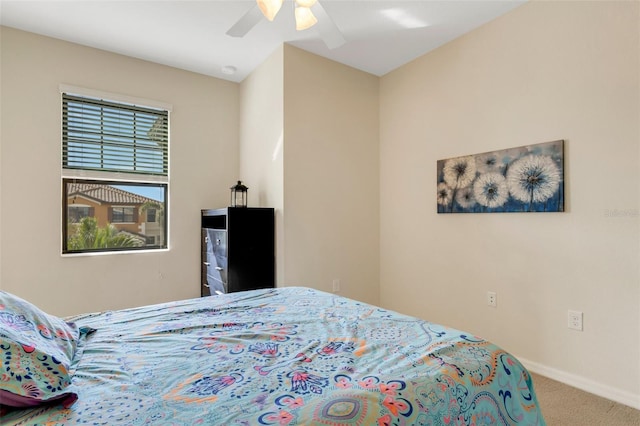 bedroom featuring carpet and ceiling fan