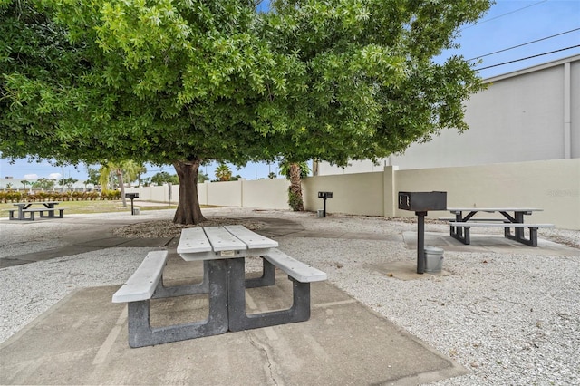 surrounding community featuring a patio area