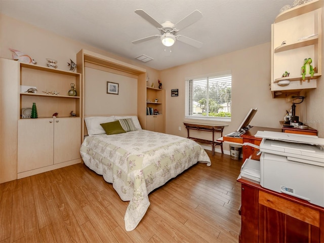 bedroom featuring ceiling fan and light hardwood / wood-style floors