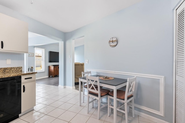 dining space with light tile patterned floors