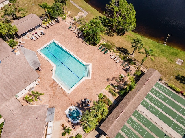 birds eye view of property featuring a water view