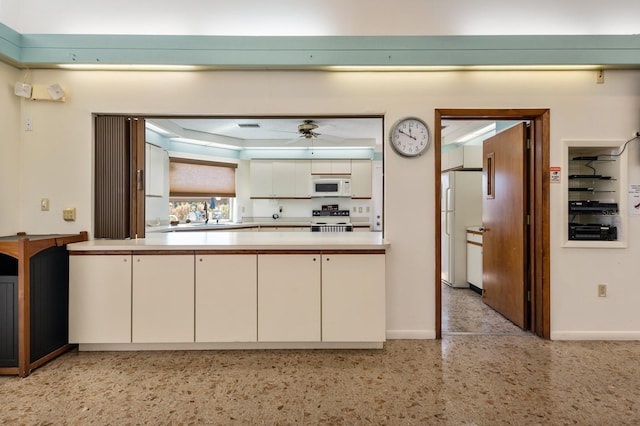 kitchen with ceiling fan, sink, and white appliances