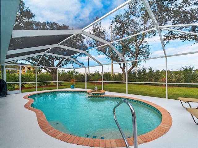 view of swimming pool featuring a lanai and a lawn