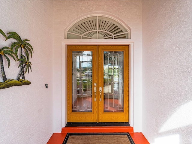 doorway to property featuring french doors