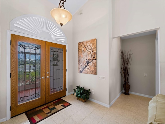 tiled foyer with french doors