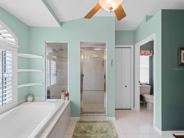 bathroom featuring toilet, ceiling fan, shower with separate bathtub, and tile patterned floors