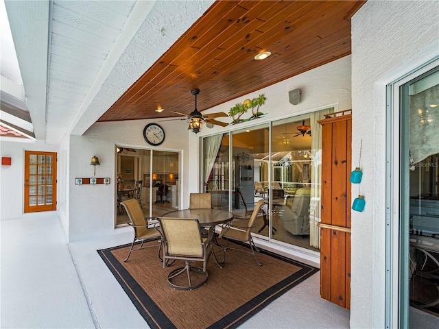 view of patio featuring ceiling fan