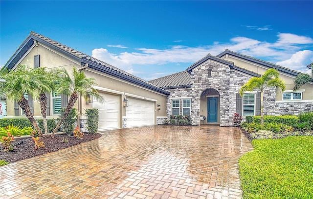 view of front of property featuring a garage