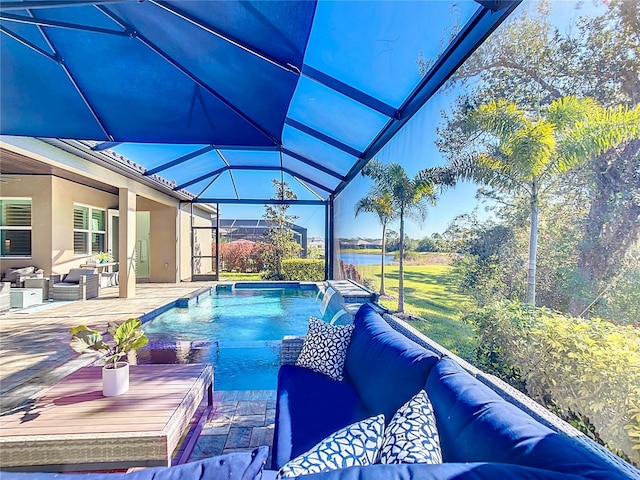 view of swimming pool with a lanai, outdoor lounge area, a patio, and a water view