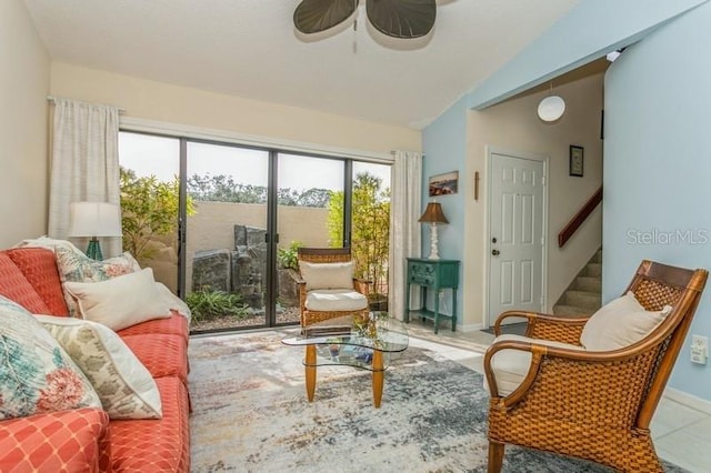 interior space with ceiling fan and lofted ceiling