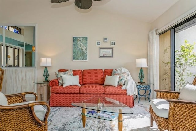 living room with vaulted ceiling and ceiling fan