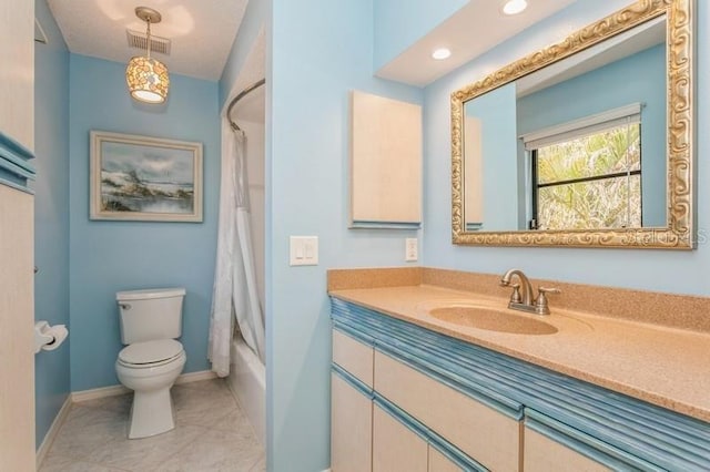 full bathroom featuring vanity, toilet, tile patterned floors, and shower / bath combo