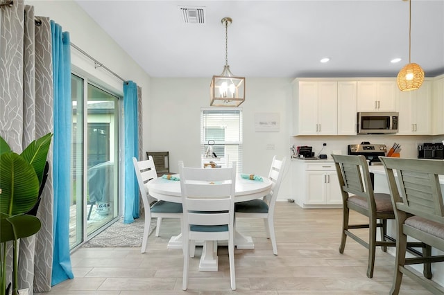 dining area featuring light hardwood / wood-style flooring