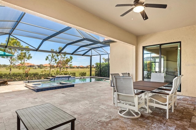 view of patio / terrace with ceiling fan, outdoor dining area, a lanai, an in ground hot tub, and an outdoor pool