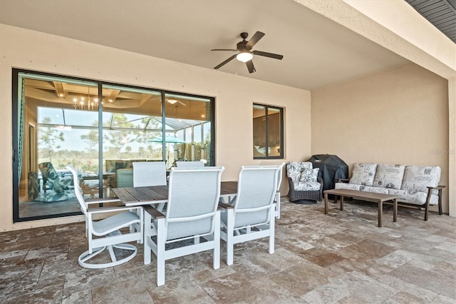 view of patio / terrace featuring a ceiling fan and outdoor dining area