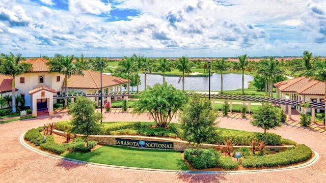 birds eye view of property with a water view