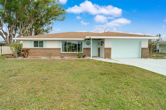 ranch-style home featuring a garage and a front lawn