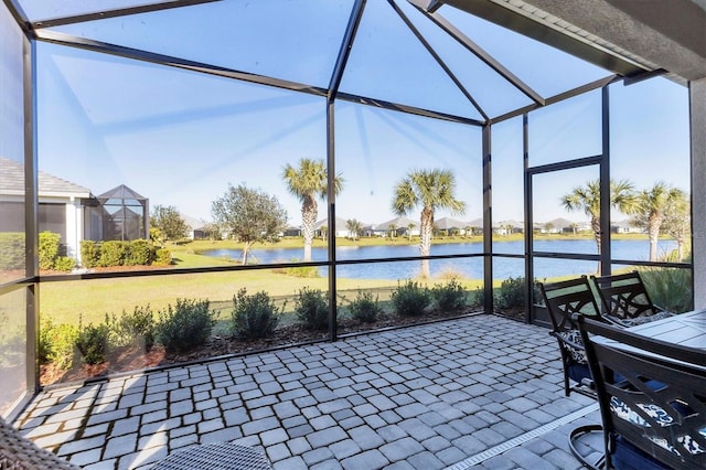 12488 Palatka Dr, Venice, FL 34293 - unfurnished sunroom featuring a water view