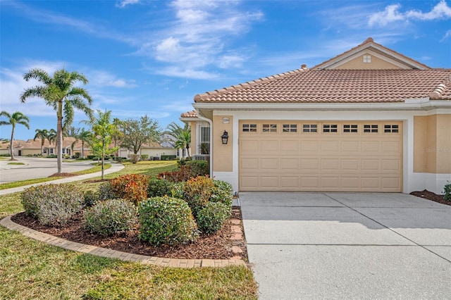 view of front of property with a garage