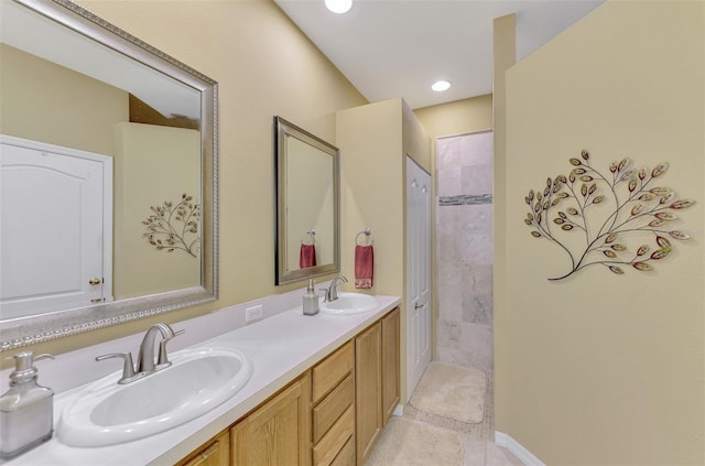 bathroom featuring tile patterned floors and vanity