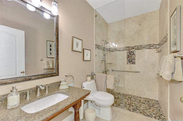 bathroom with sink, tile patterned floors, toilet, and a shower with door