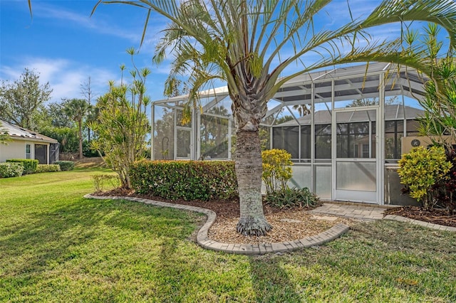 view of yard featuring a lanai