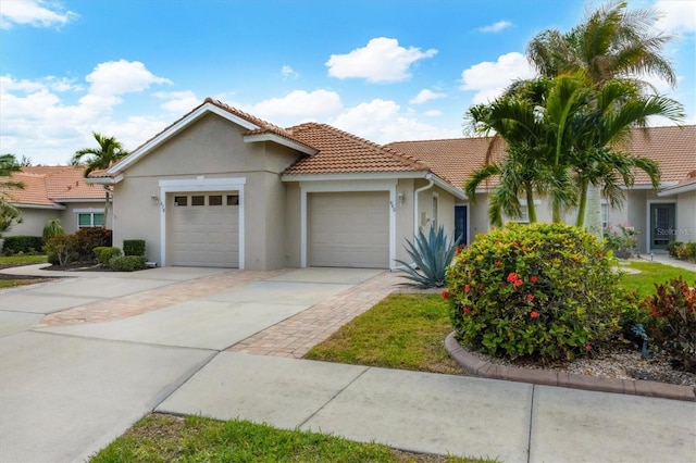 view of front of home with a garage