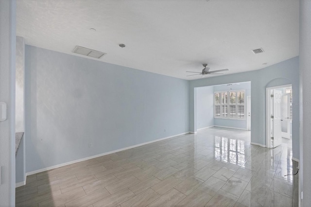 empty room featuring ceiling fan