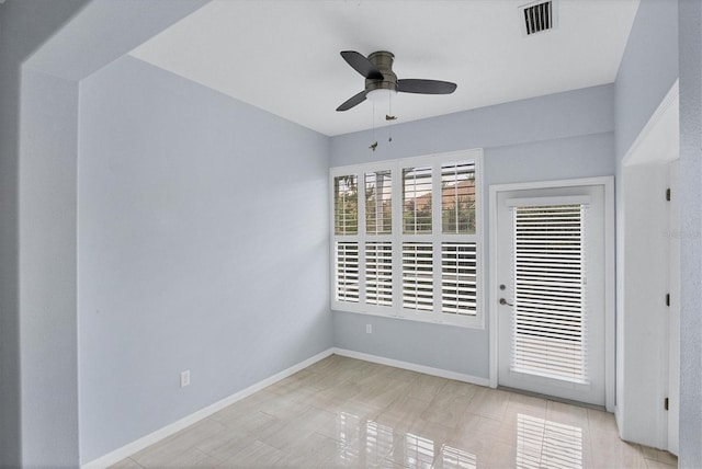 spare room featuring ceiling fan