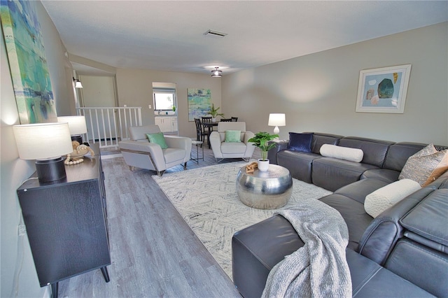 living room with hardwood / wood-style floors