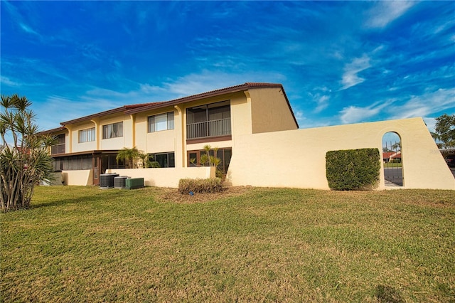 view of property featuring central AC unit