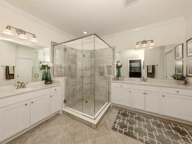 bathroom with an enclosed shower, crown molding, tile patterned floors, and vanity