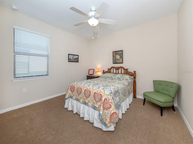 bedroom featuring ceiling fan and carpet flooring