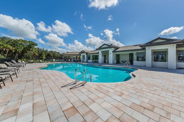 view of pool featuring a patio