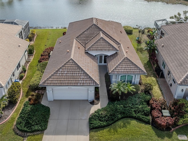 bird's eye view with a water view