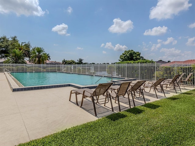 view of pool featuring a patio area