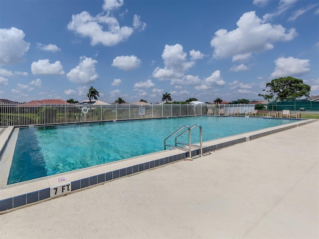 view of pool featuring a patio area