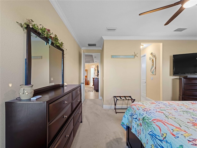 carpeted bedroom with crown molding and ceiling fan