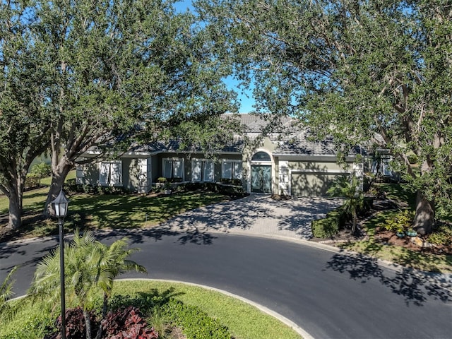 view of front of property featuring a garage