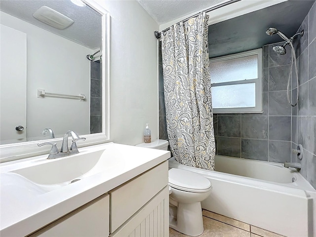 full bathroom featuring a textured ceiling, tile patterned flooring, vanity, shower / bath combination with curtain, and toilet