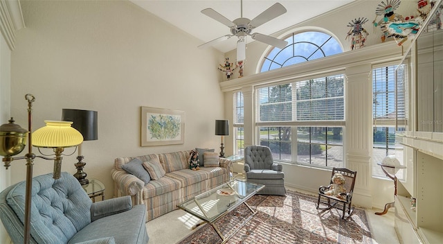 living room with high vaulted ceiling and ceiling fan