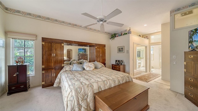 carpeted bedroom with ceiling fan