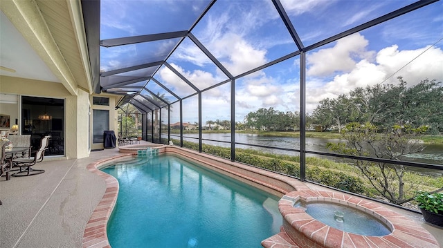 view of swimming pool featuring an in ground hot tub, a water view, and a lanai