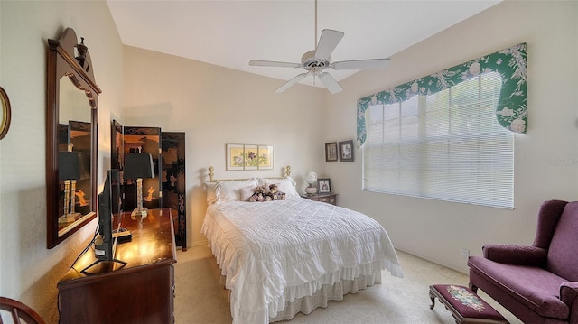 bedroom with light colored carpet and ceiling fan