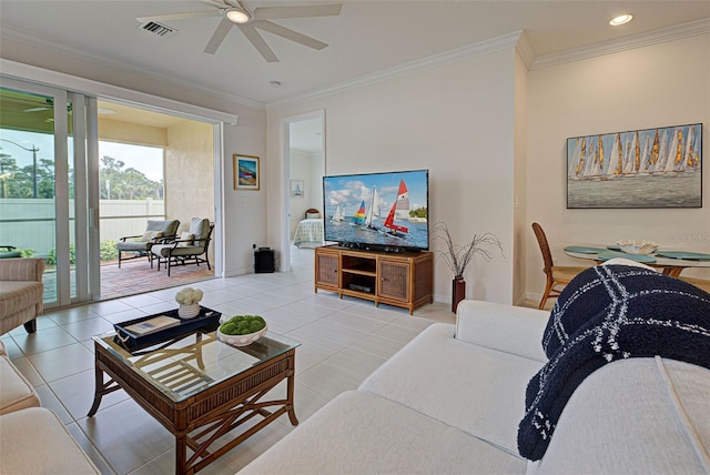 tiled living room with crown molding and ceiling fan