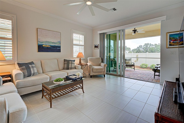 tiled living room featuring crown molding, plenty of natural light, and ceiling fan