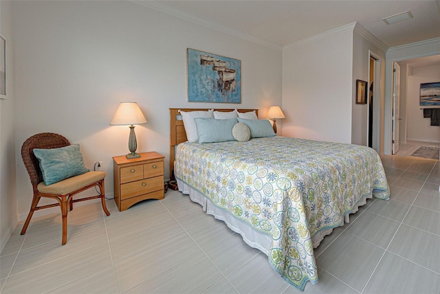 tiled bedroom featuring ornamental molding