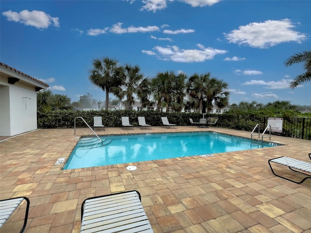 view of pool with a patio area