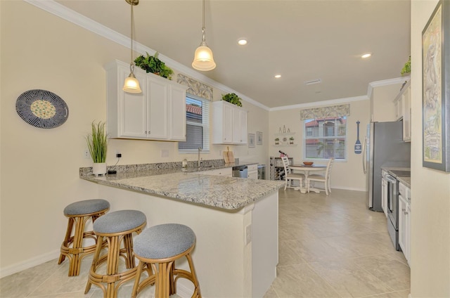 kitchen featuring white cabinetry, decorative light fixtures, ornamental molding, kitchen peninsula, and stainless steel appliances