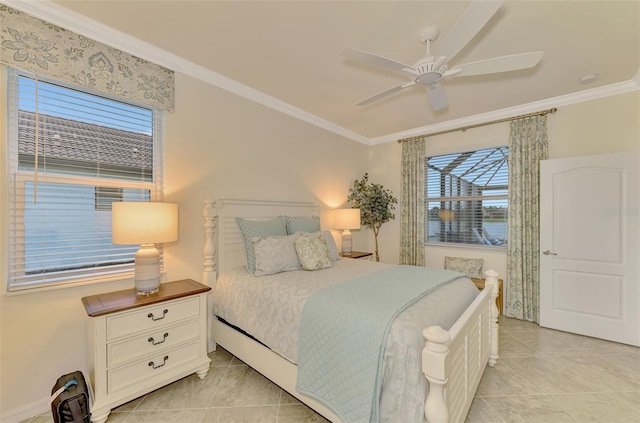 tiled bedroom featuring ornamental molding, ceiling fan, and a water view